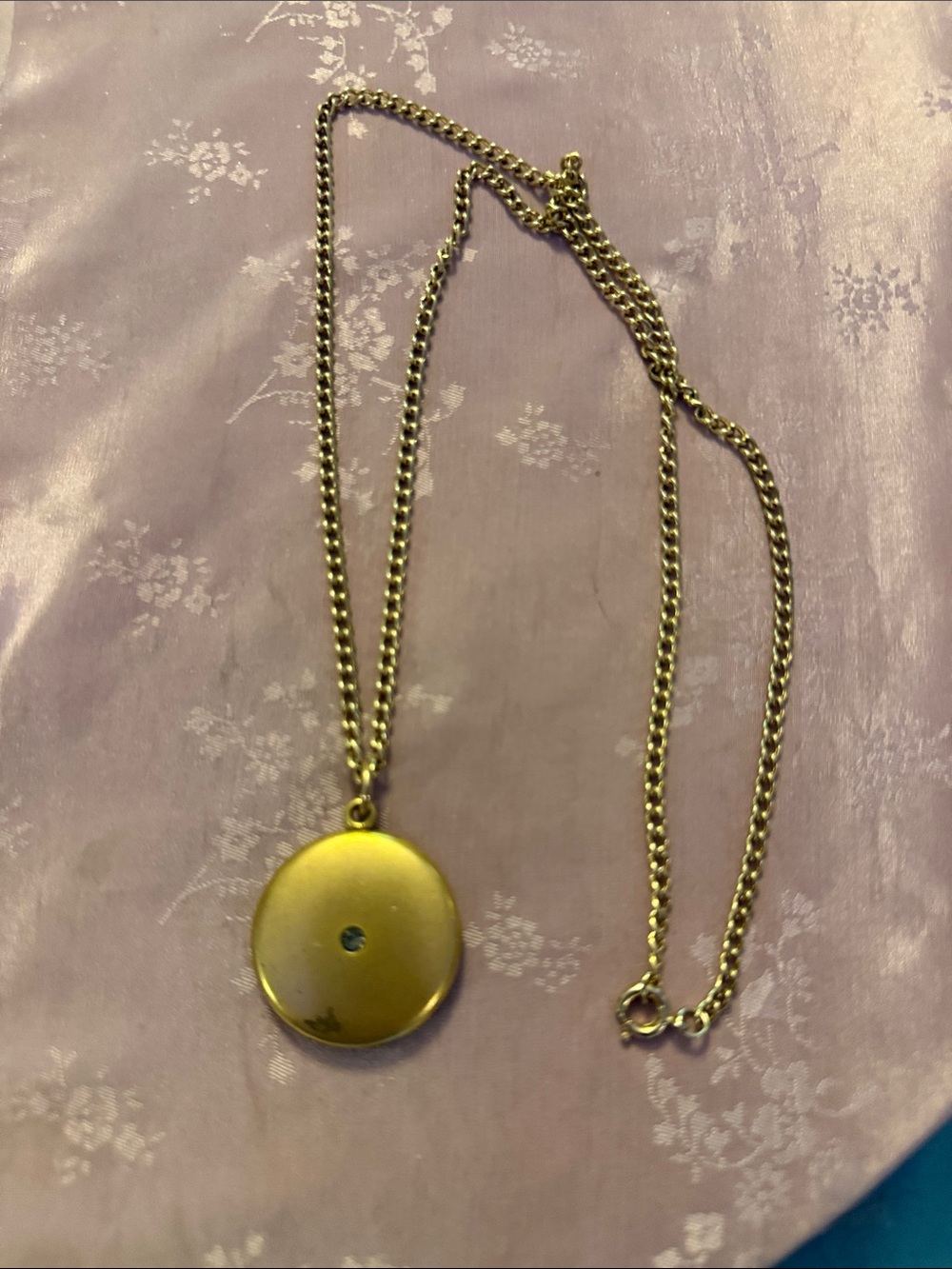 Gold plated, antique locket necklace